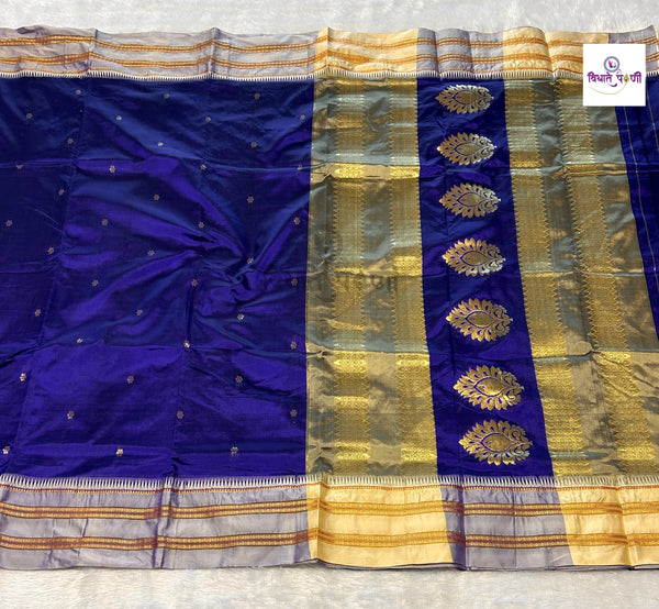 Blue Narayanpeth single ply pure silk saree with a white border, zari buttis and a mango motif pallu