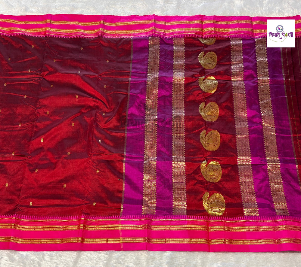 Reddish maroon Narayanpeth single ply pure silk saree with zari buttis and a mango motif pallu