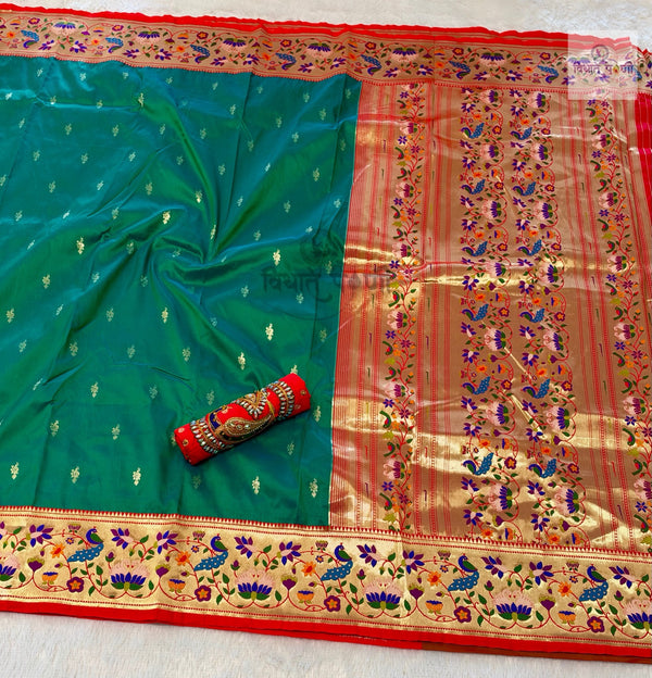 Rajhauns Semi Paithani Saree in Teal Green with gold floral pallu and designer red Aari work blouse