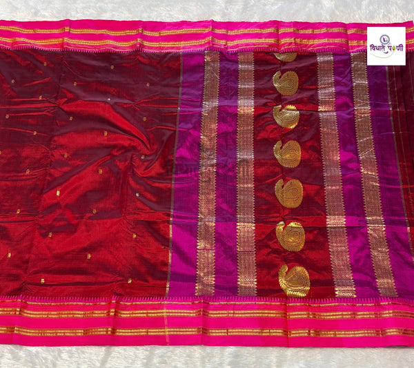 Reddish maroon Narayanpeth single ply pure silk saree with zari buttis and a mango motif pallu