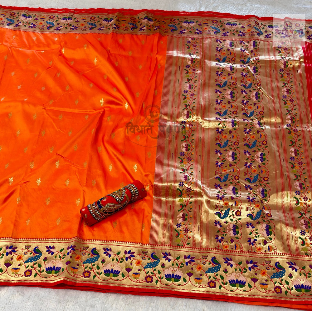 Rajhauns Semi Paithani Saree in Orange with gold floral pallu and designer red Aari work blouse