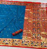 Rajhauns Semi Paithani Saree in Sky Blue with gold floral pallu and designer red Aari work blouse